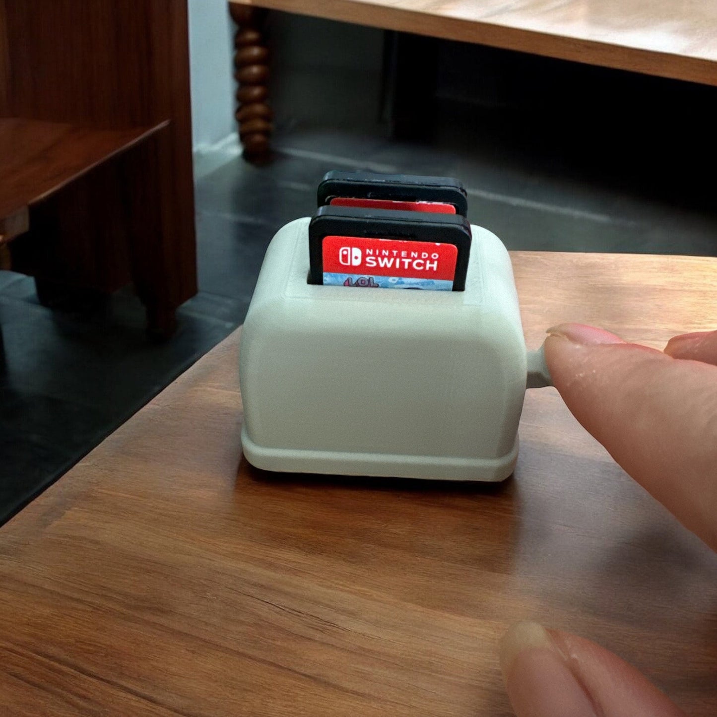 Mini toaster switch game holder